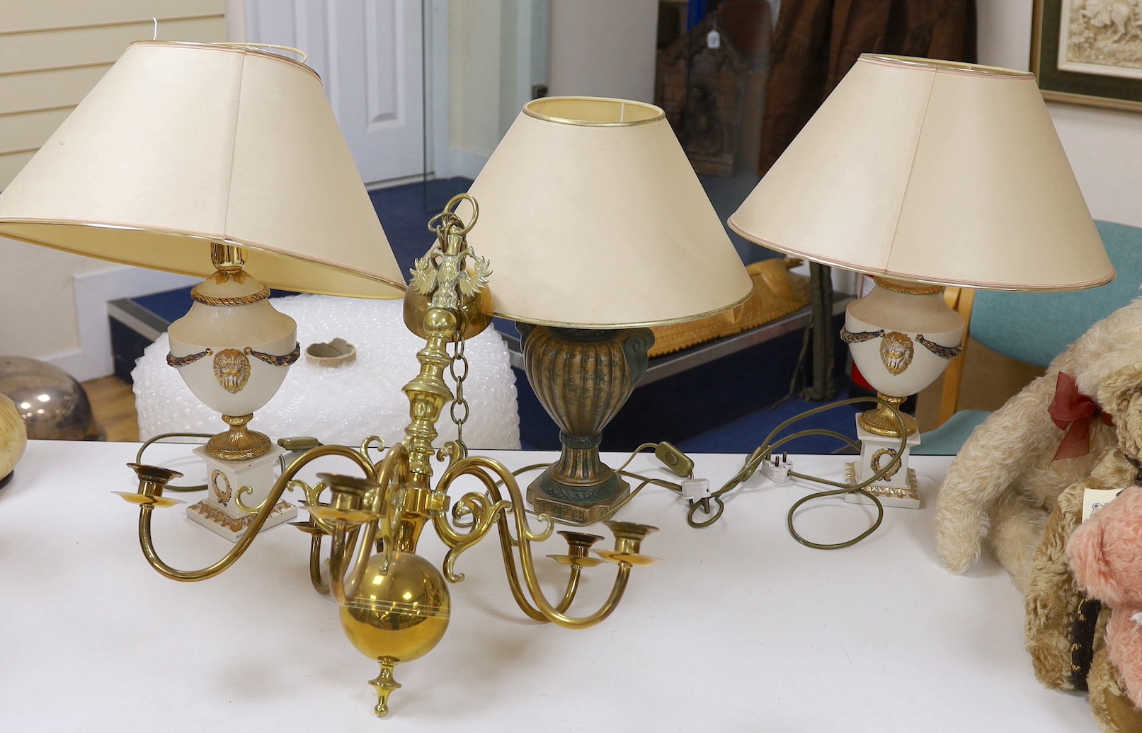 Three neoclassical ceramic table lamps and an electrolier. Tallest 58cm with shade